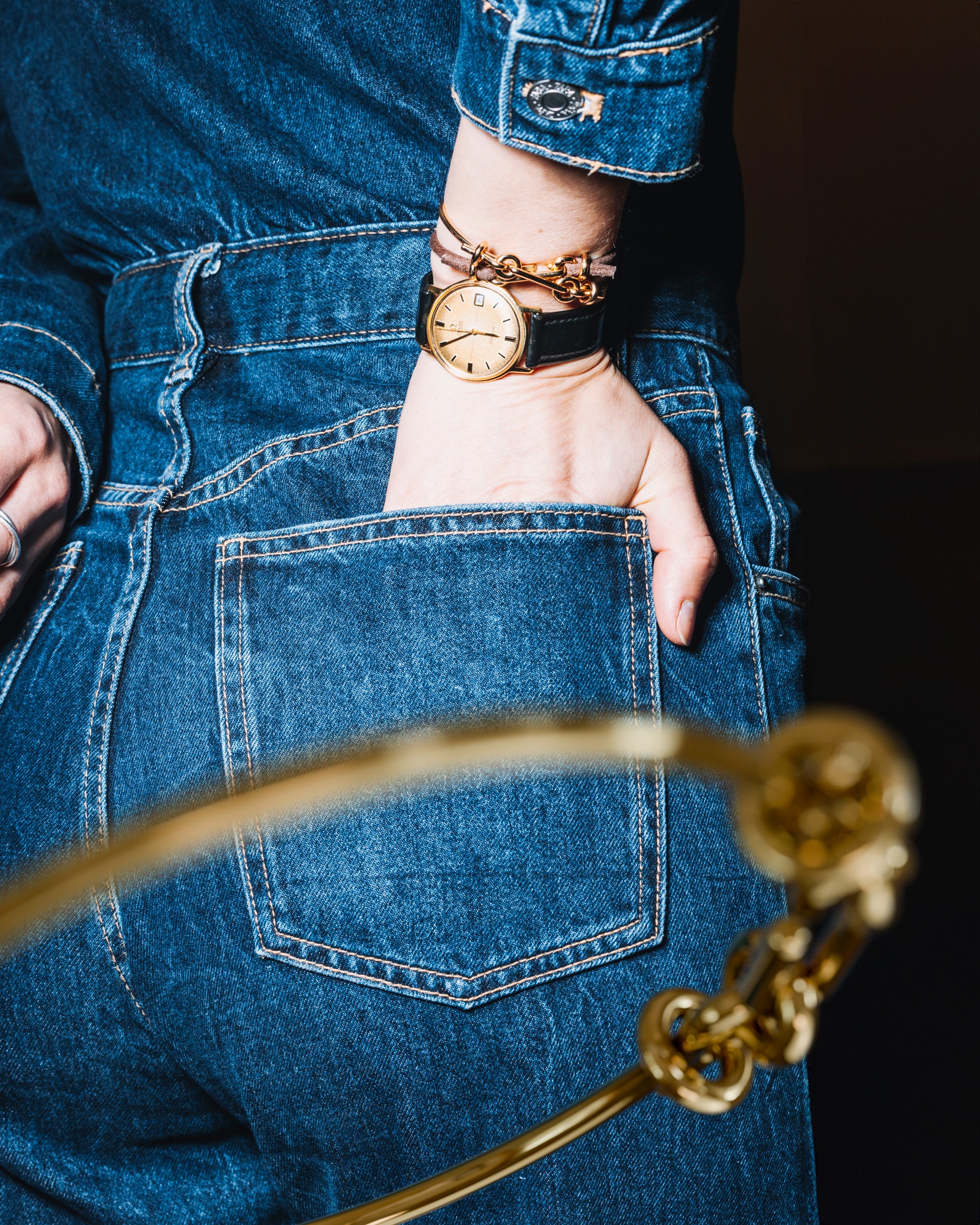 Collage of the handmade bracelet with gold band and gold clasp, from the BOND collection by OFFFHAND. Designed by Michael Rüscher.