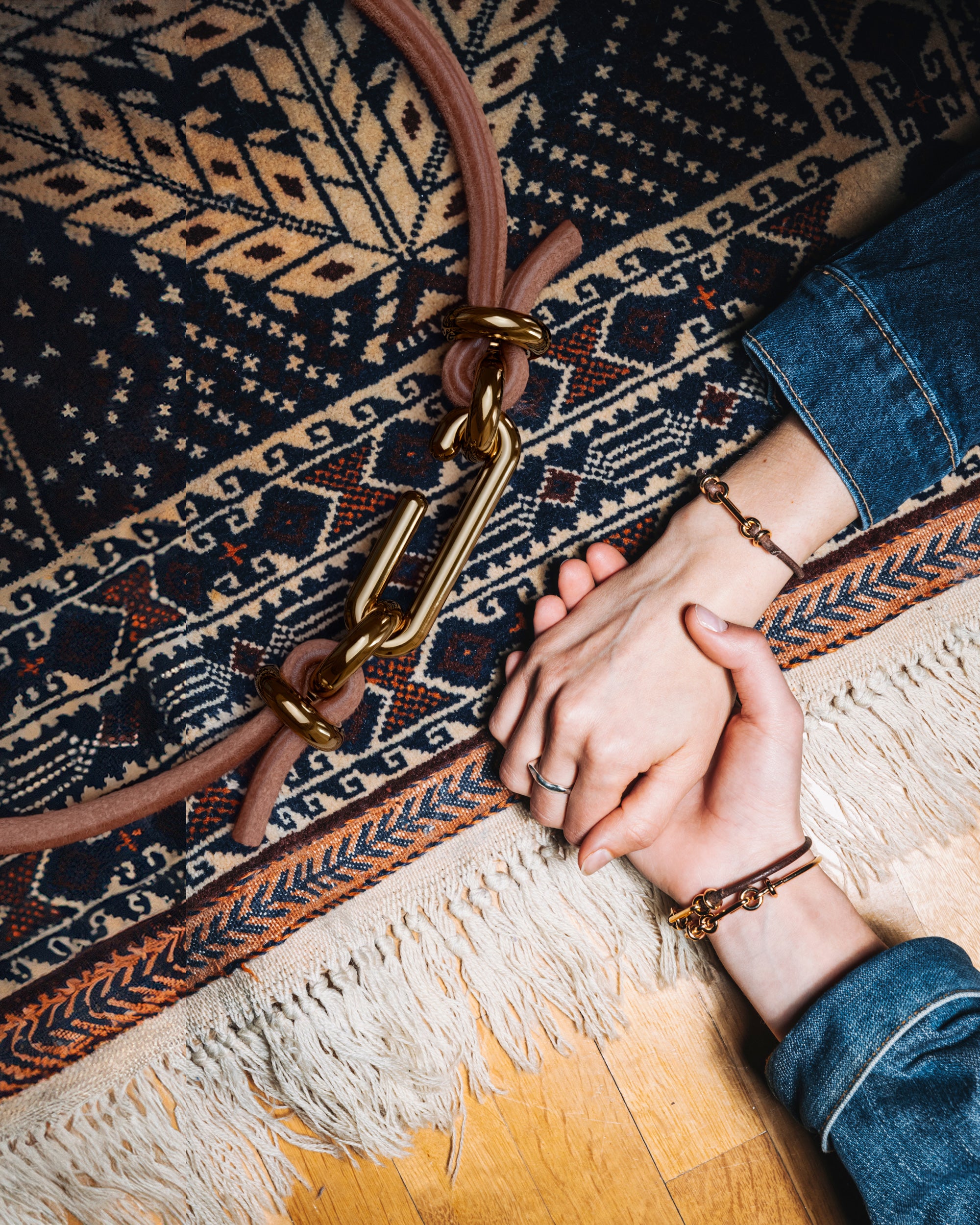 Collage of the handmade bracelet with leather light band and gold clasp, from the BOND collection by OFFFHAND. Designed by Michael Rüscher.