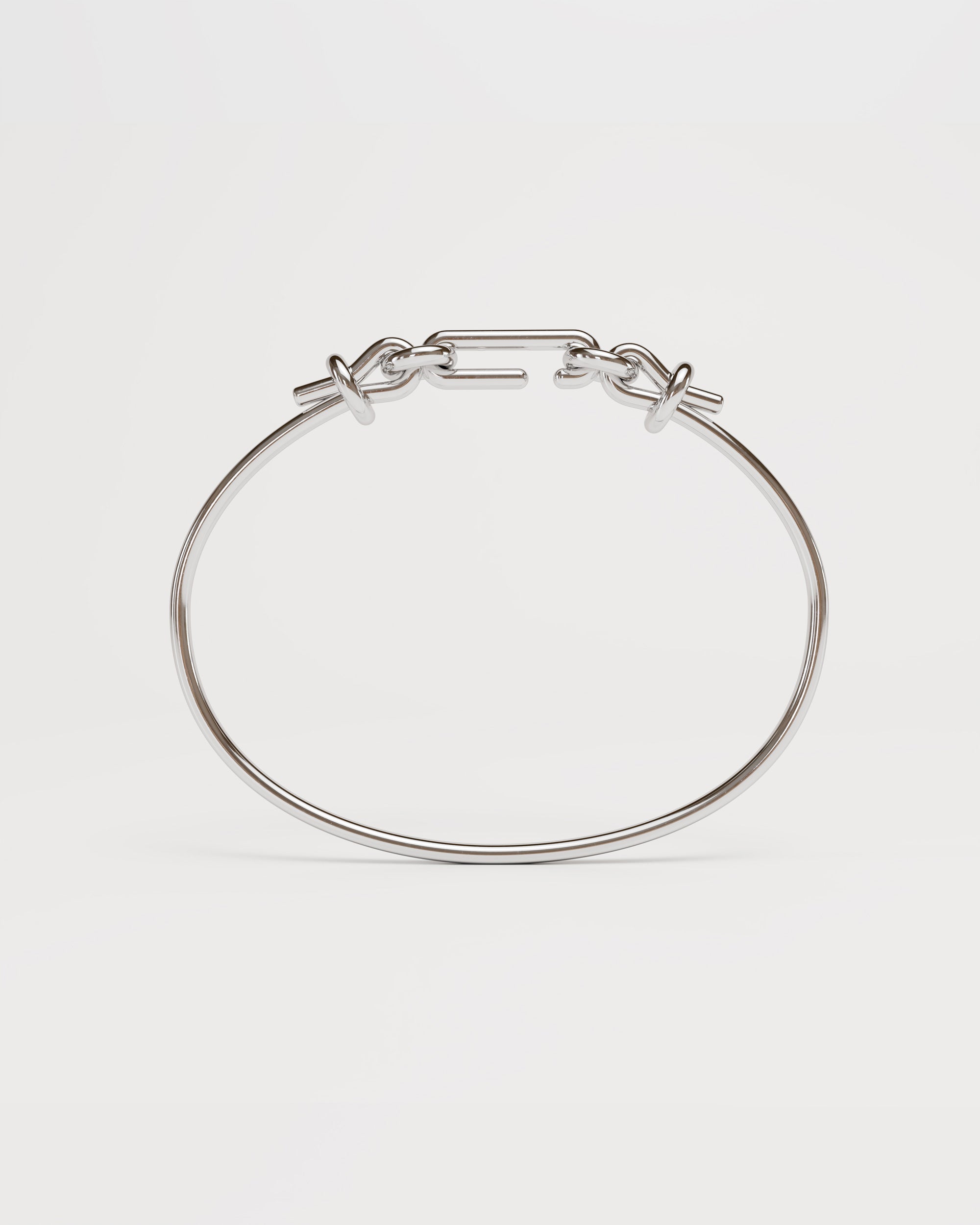 Packshot of the handmade bracelet with silver band and silver clasp, from the BOND collection by OFFFHAND. Designed by Michael Rüscher.