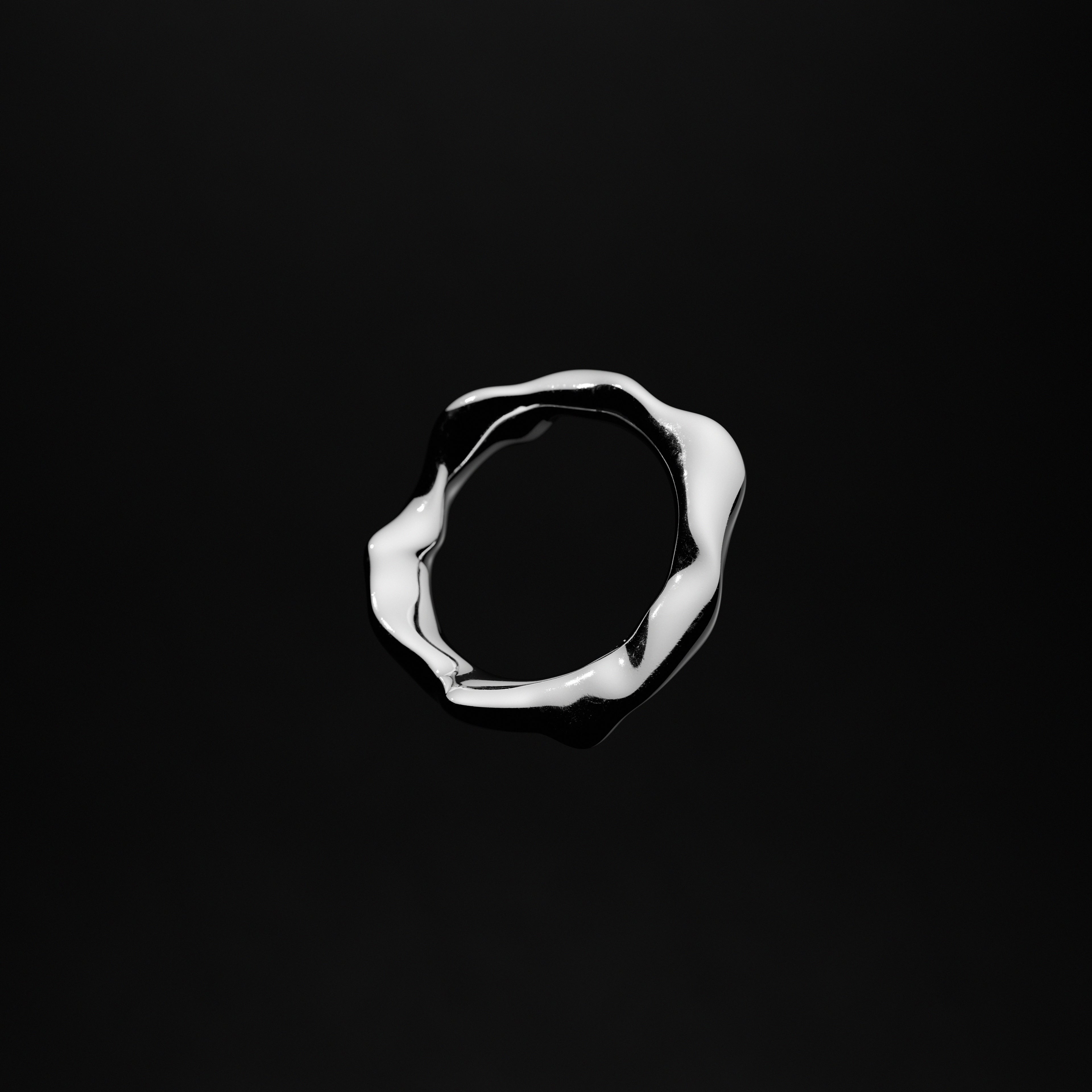 Handmade platinum Melt ring from the GLOW collection by OFFFHAND. Designed by Michael Rüscher.