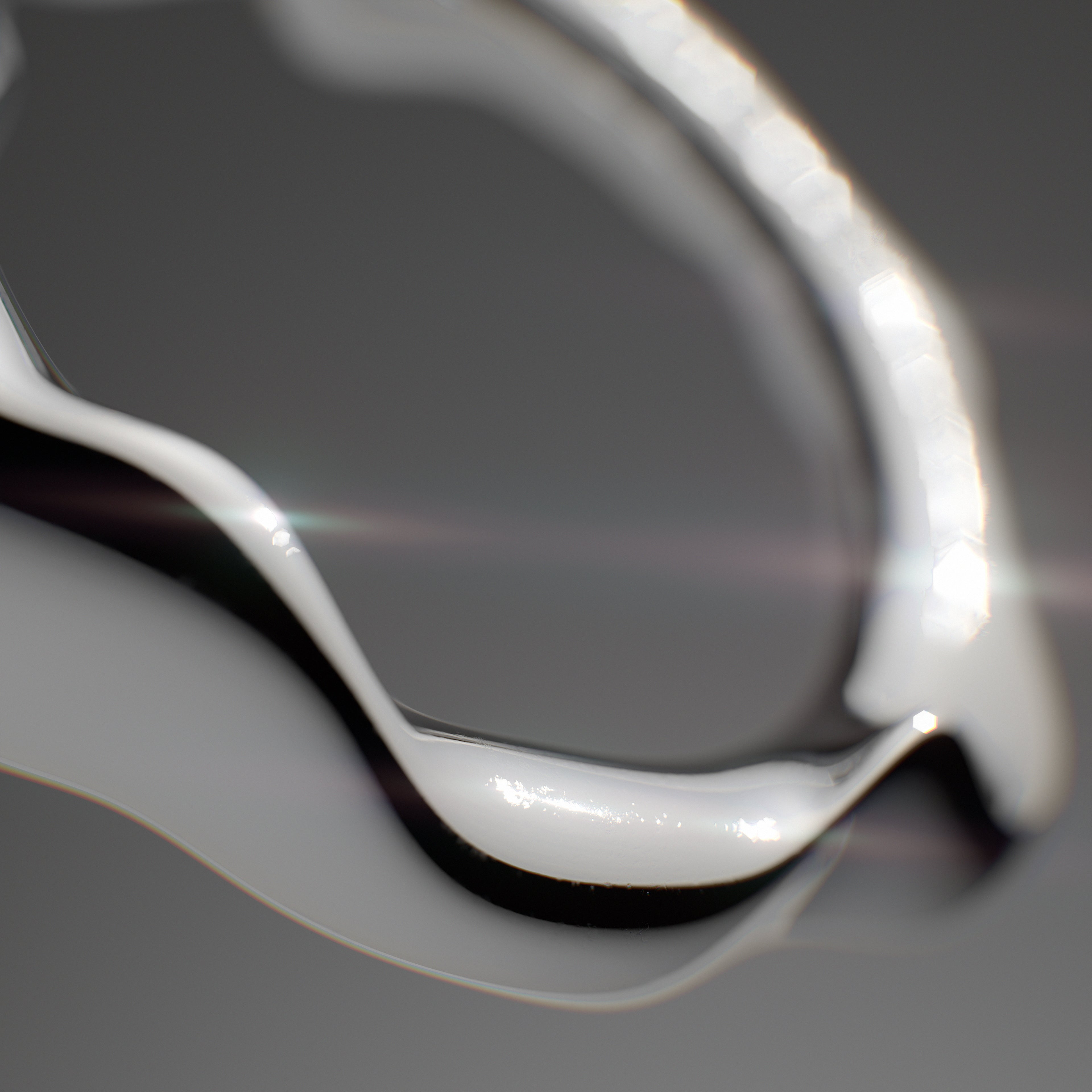 Handmade silver Melt ring from the GLOW collection by OFFFHAND. Designed by Michael Rüscher.