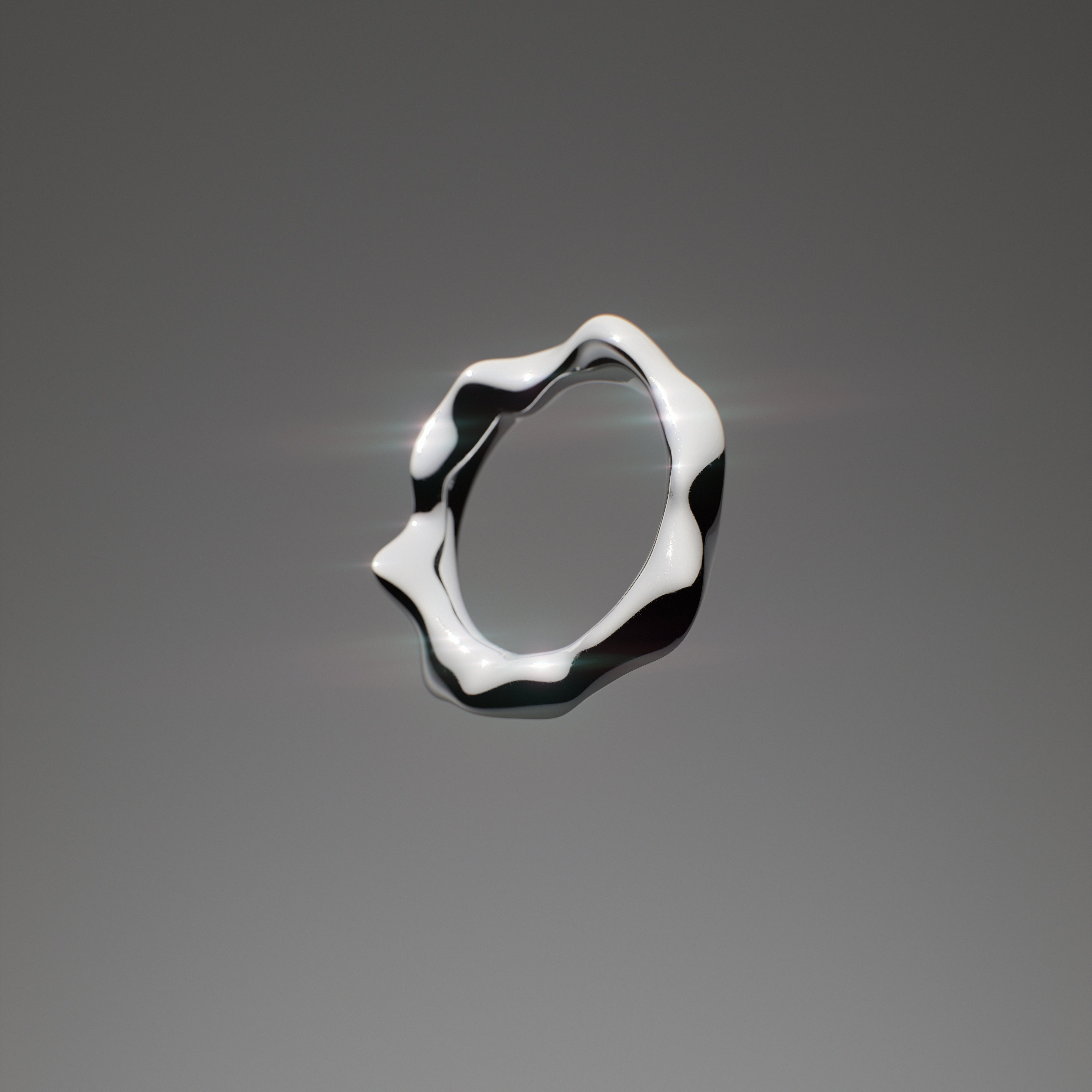 Handmade silver Melt ring from the GLOW collection by OFFFHAND. Designed by Michael Rüscher.