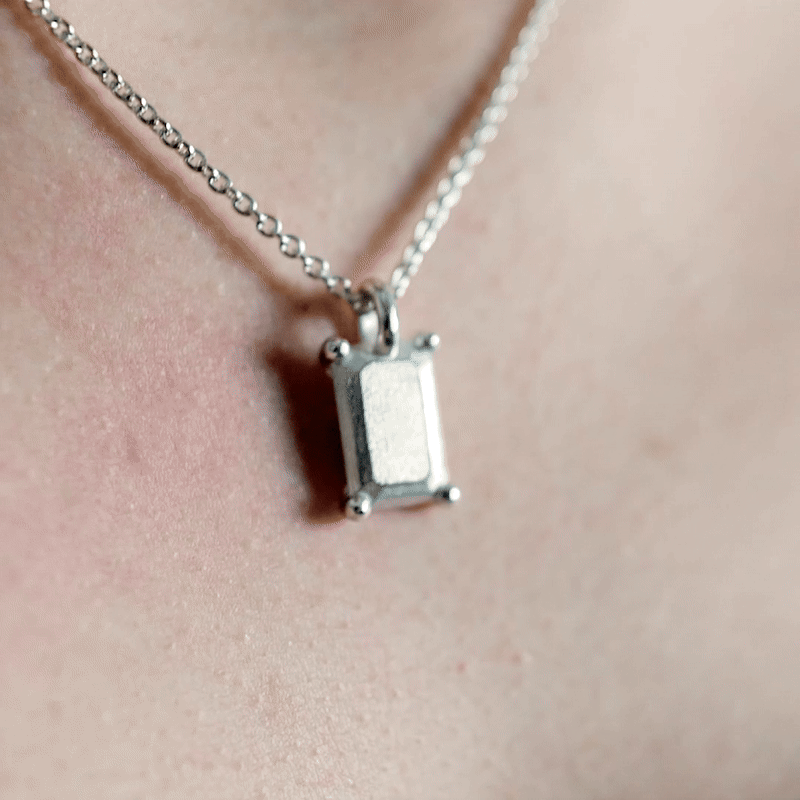 Handmade large silver emerald charm from the LOST collection by OFFFHAND. Designed by Michael Rüscher.