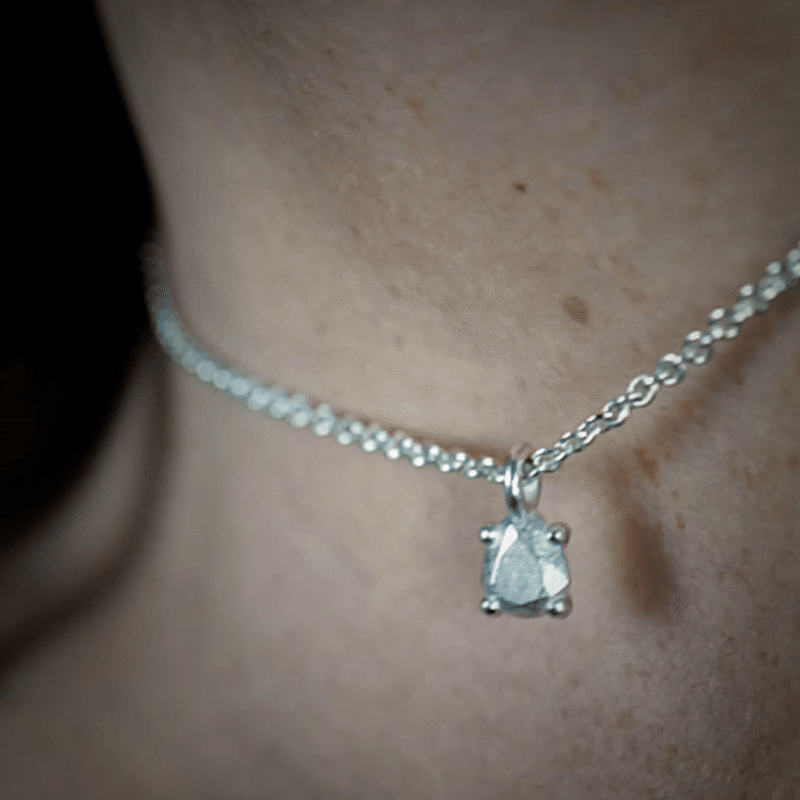 Handmade small platinum pear charm from the LOST collection by OFFFHAND. Designed by Michael Rüscher.