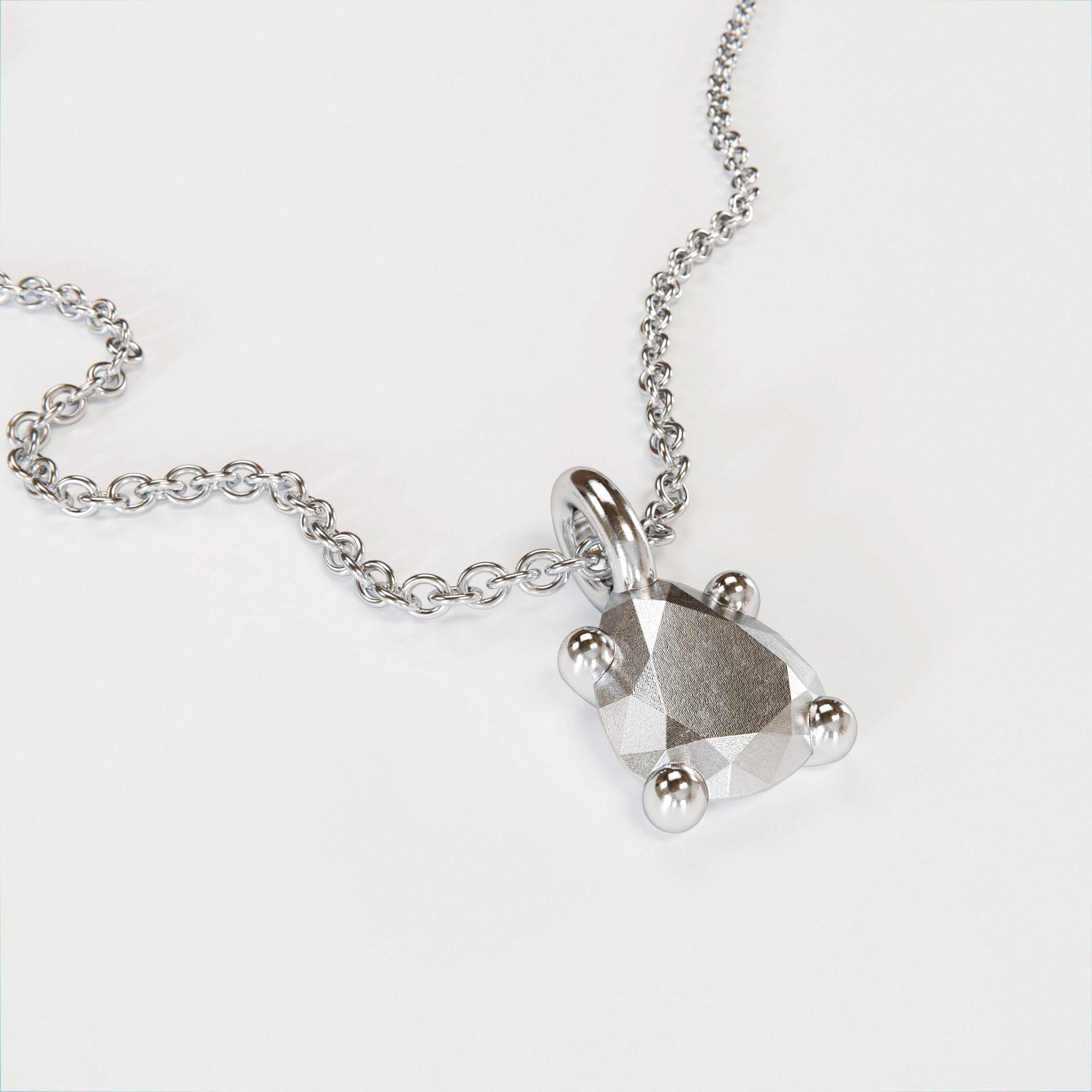 Handmade large silver pear charm from the LOST collection by OFFFHAND. Designed by Michael Rüscher.