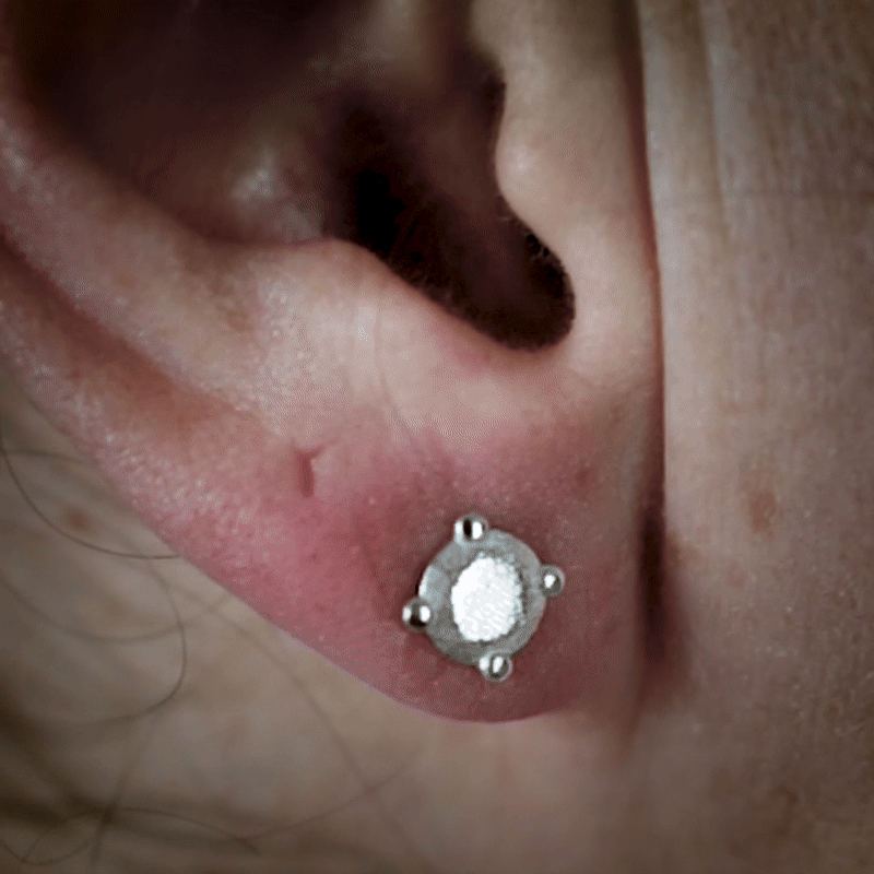 Handmade small platinum brillant earring from the LOST collection by OFFFHAND. Designed by Michael Rüscher.