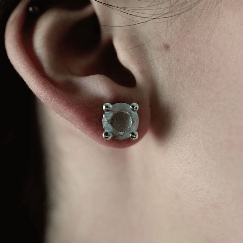 Handmade large silver brillant earring from the LOST collection by OFFFHAND. Designed by Michael Rüscher.