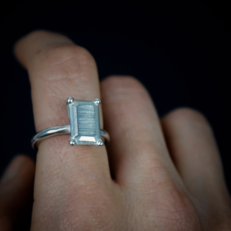 Handmade small platinum emerald ring from the LOST collection by OFFFHAND. Designed by Michael Rüscher.