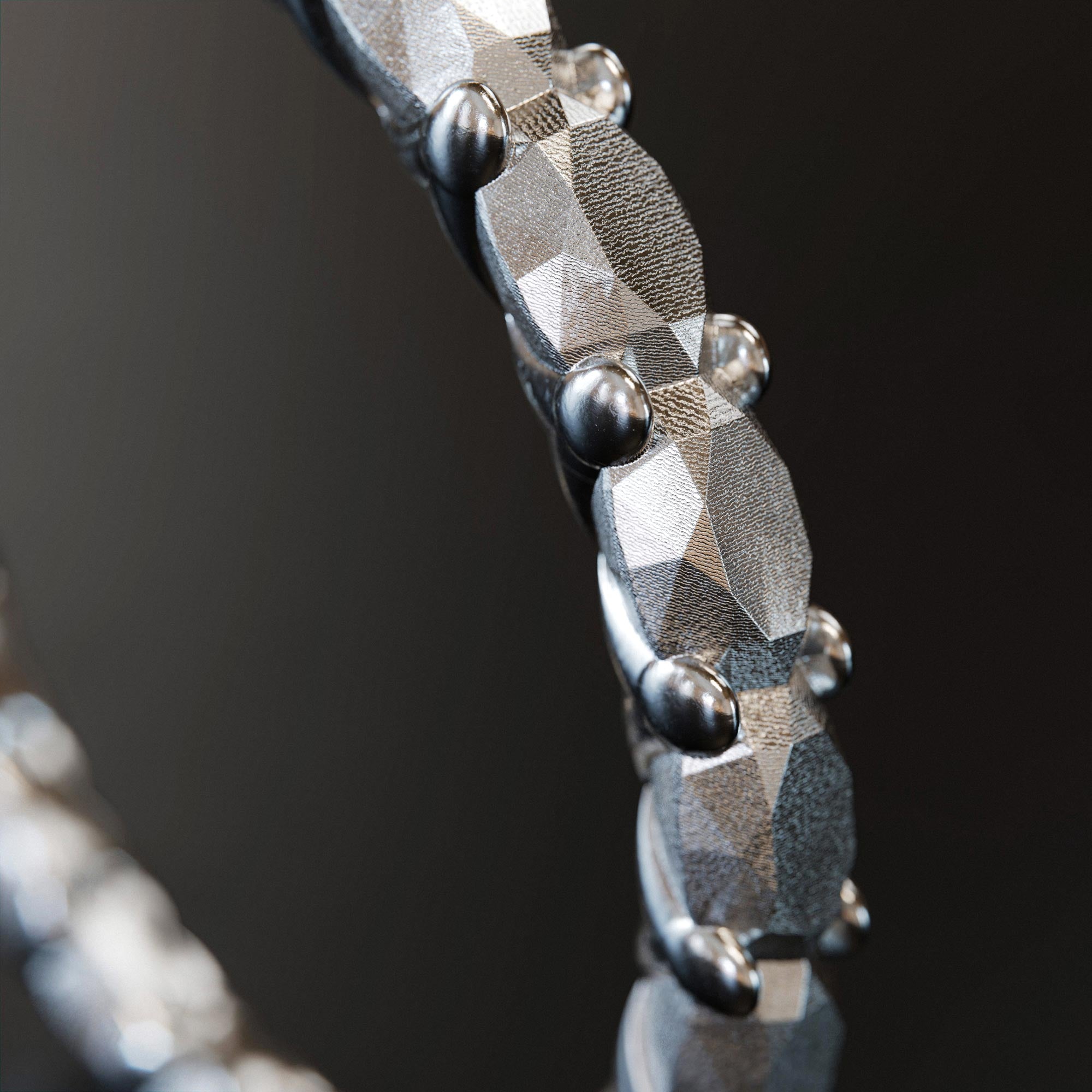 Detail view of the handmade small platinum memoire ring from the LOST collection by OFFFHAND. Designed by Michael Rüscher.