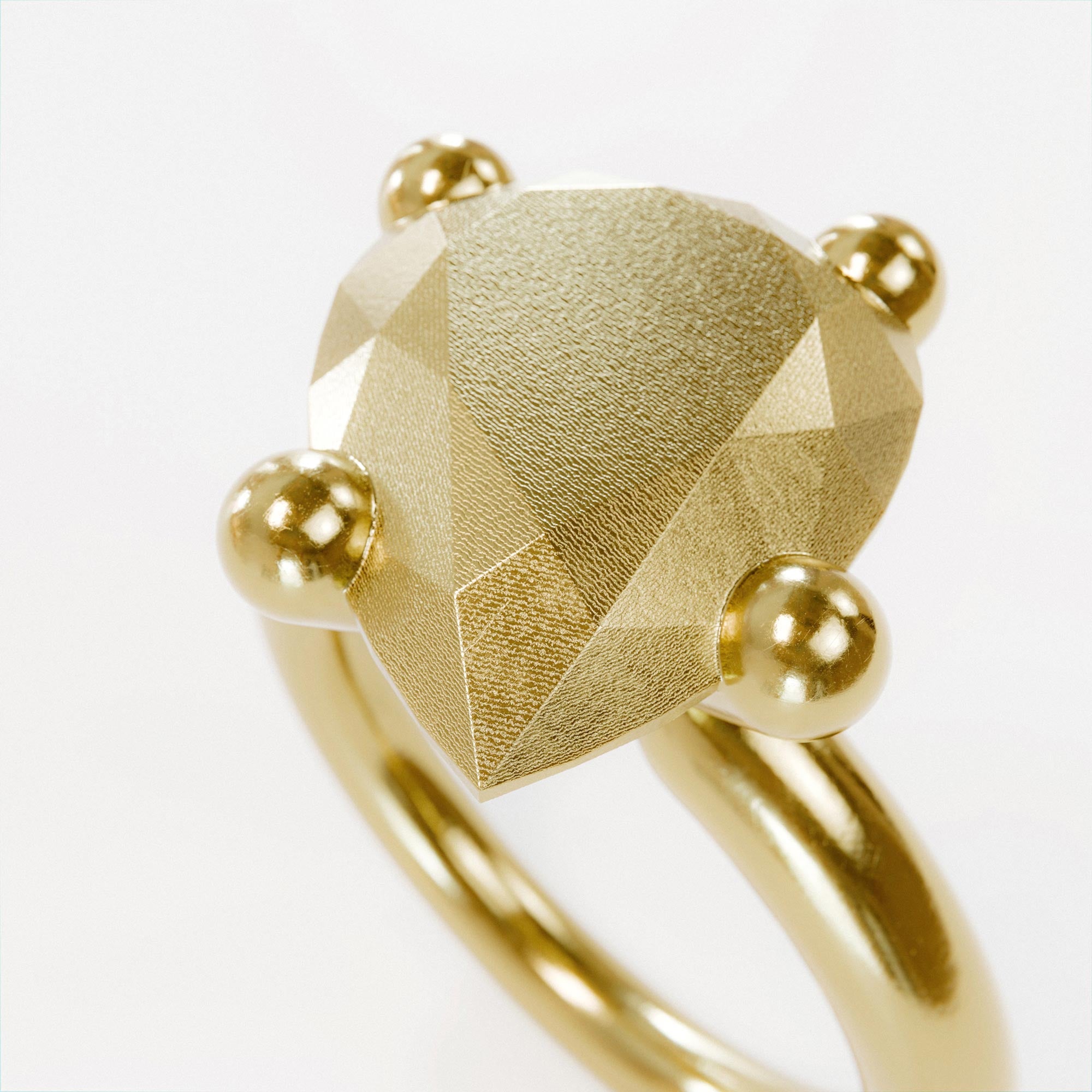 Detail view of the handmade large gold pear ring from the LOST collection by OFFFHAND. Designed by Michael Rüscher.