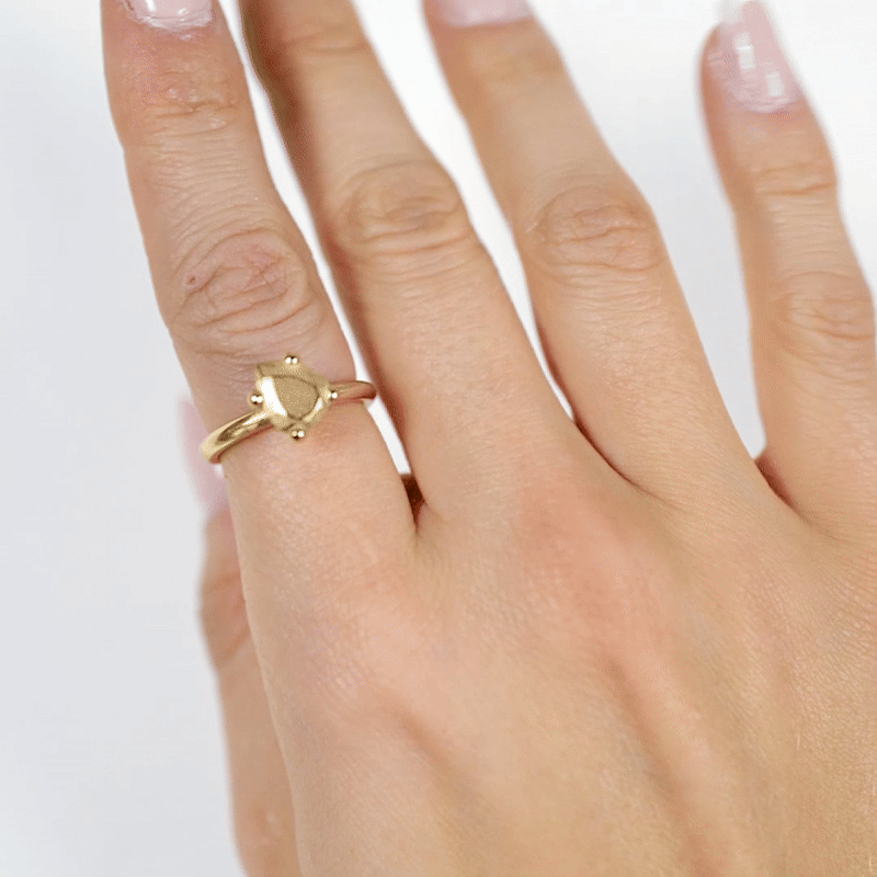 Handmade small gold pear ring from the LOST collection by OFFFHAND. Designed by Michael Rüscher.