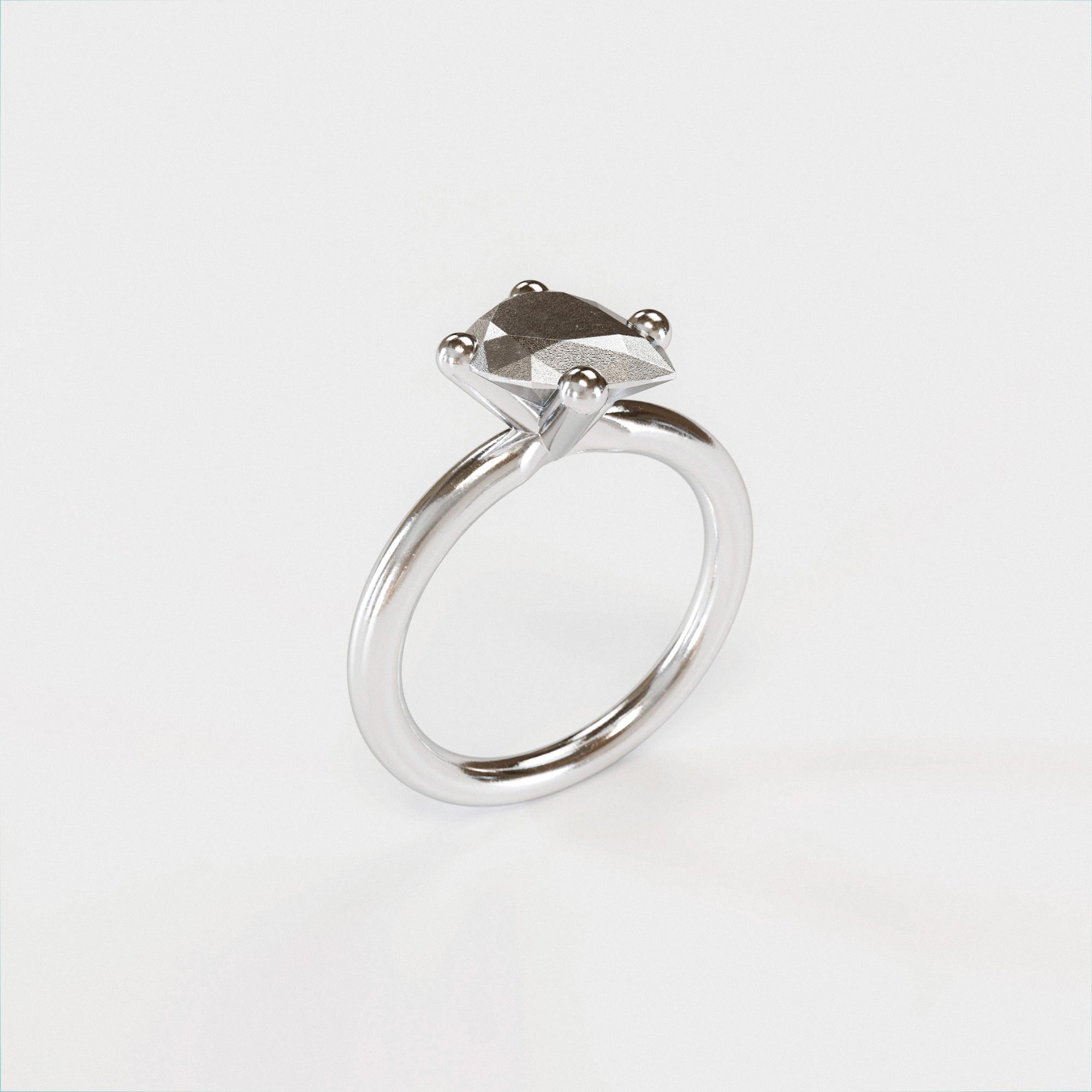 Handmade small silver pear ring from the LOST collection by OFFFHAND. Designed by Michael Rüscher.