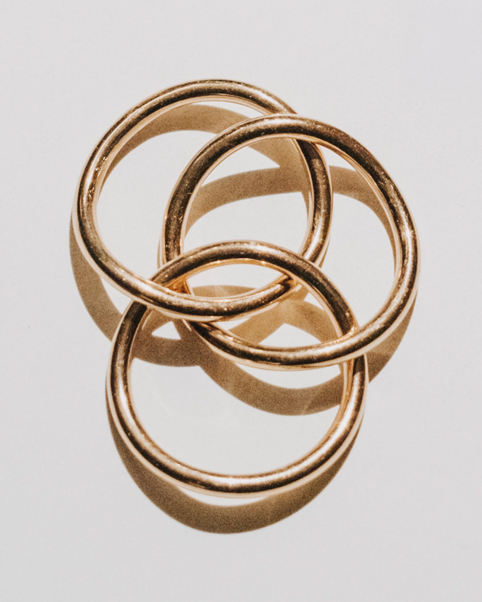 Three custom-made gold rings from OFFFHAND Individuals.
