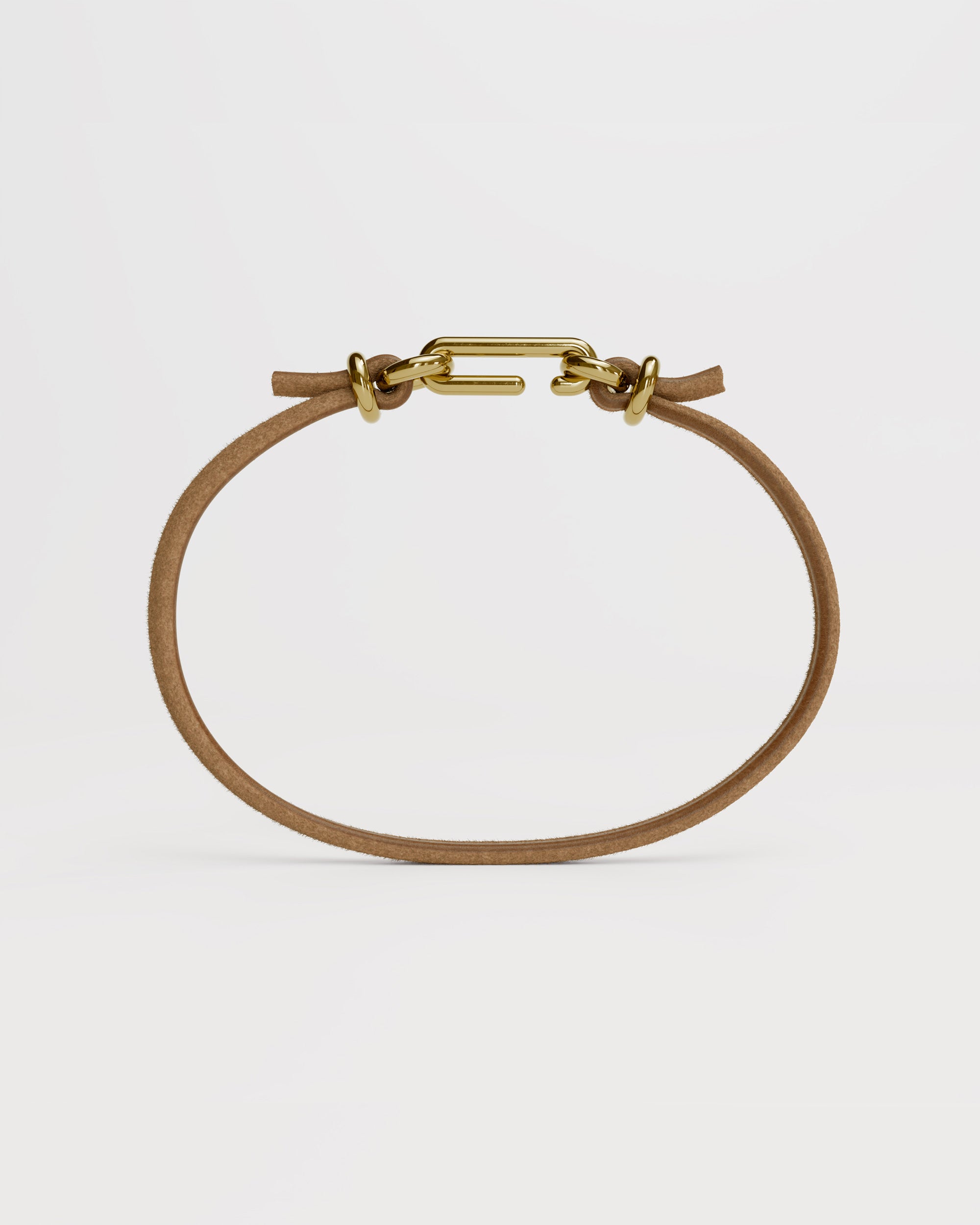 Packshot of the handmade bracelet with leather light band and gold clasp, from the BOND collection by OFFFHAND. Designed by Michael Rüscher.