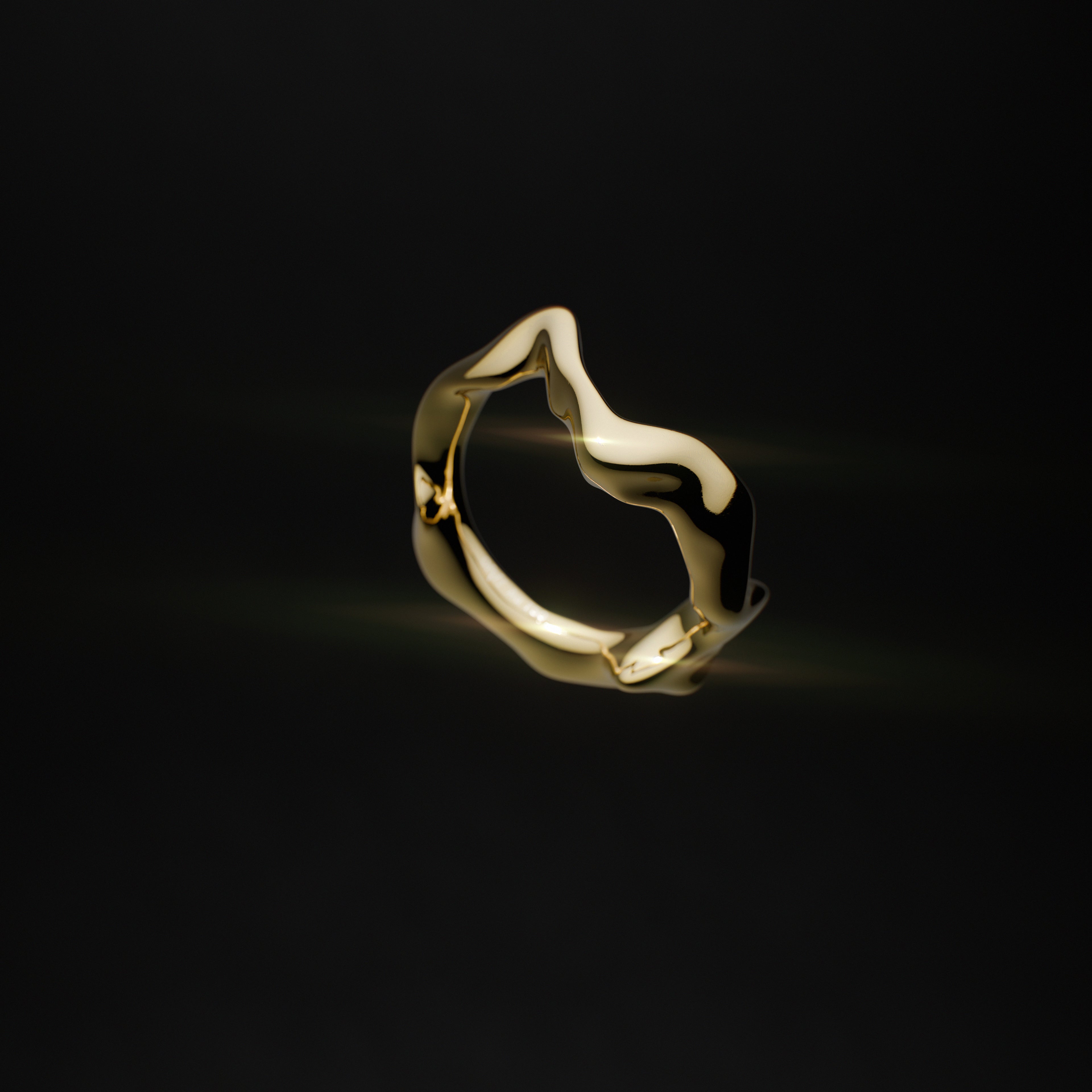 Handmade gold Distort ring from the GLOW collection by OFFFHAND. Designed by Michael Rüscher.