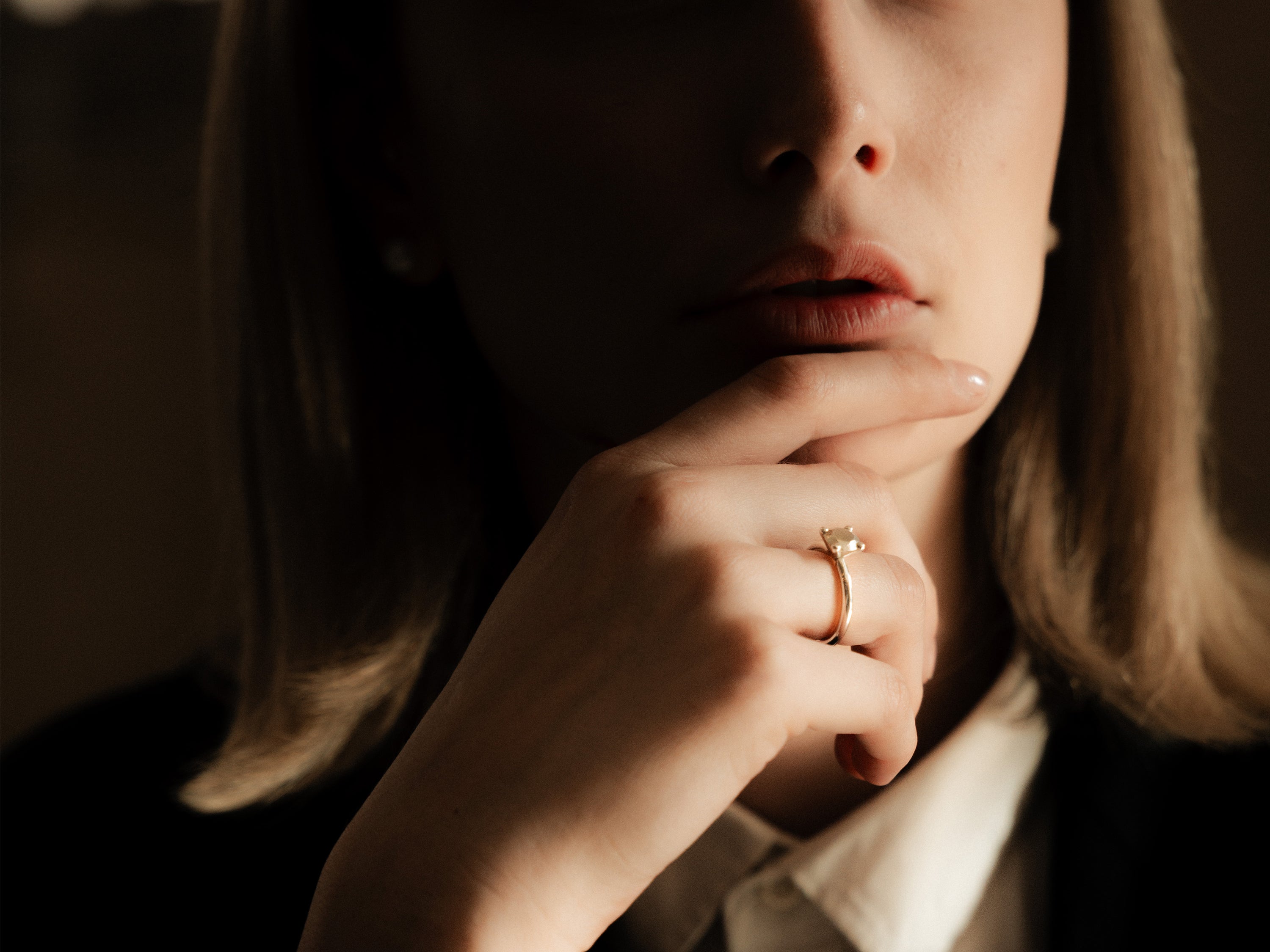 Close-up of a model wearing the This Is Not a Diamond Ring by OFFFHAND.